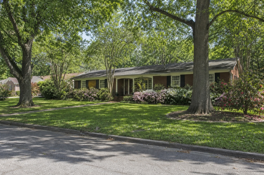 Established Montgomery neighborhood with one-story brick homes and mature trees