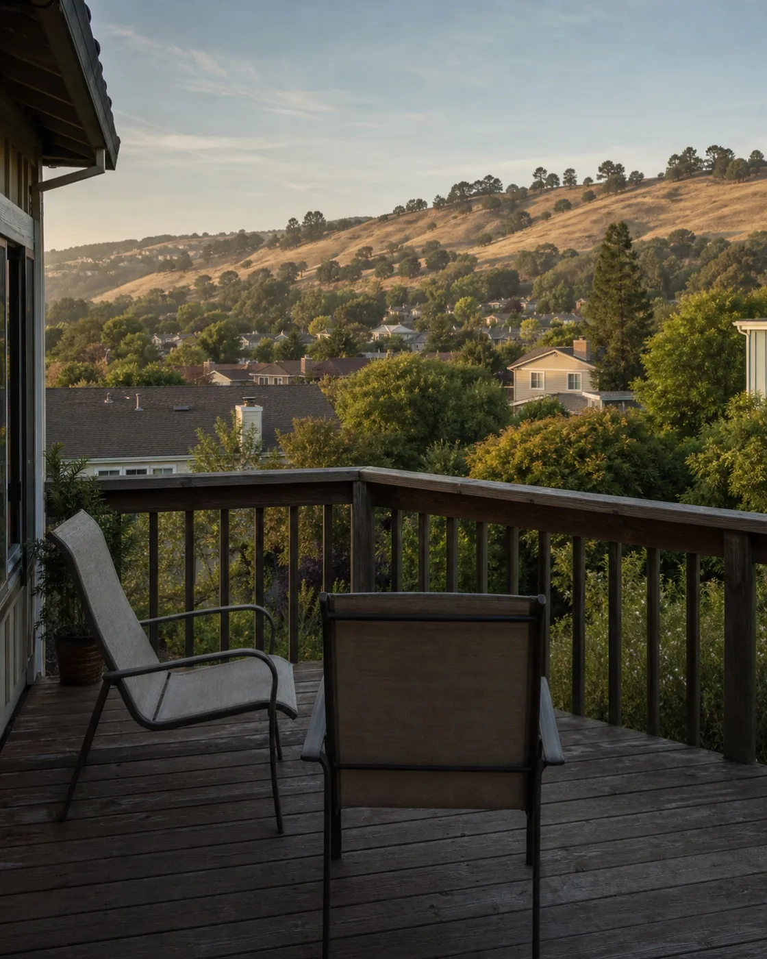 Established hillside neighborhood viewed from a simple residential deck